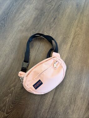Jansport Light Pink Crossbody Waist Bag with Black Strap